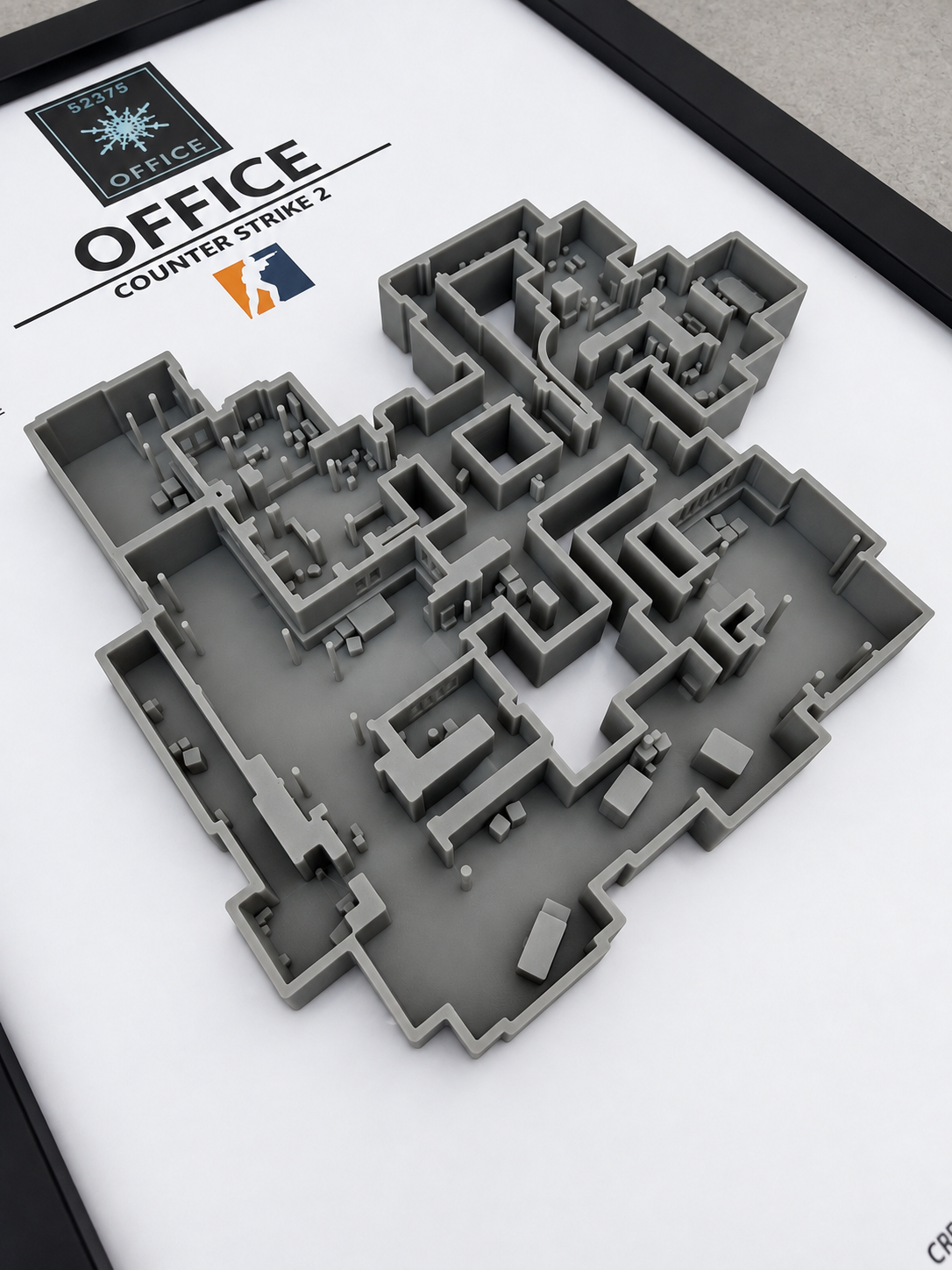Close-up of the 3D printed relief of Office, CS2 hostage map in a black frame